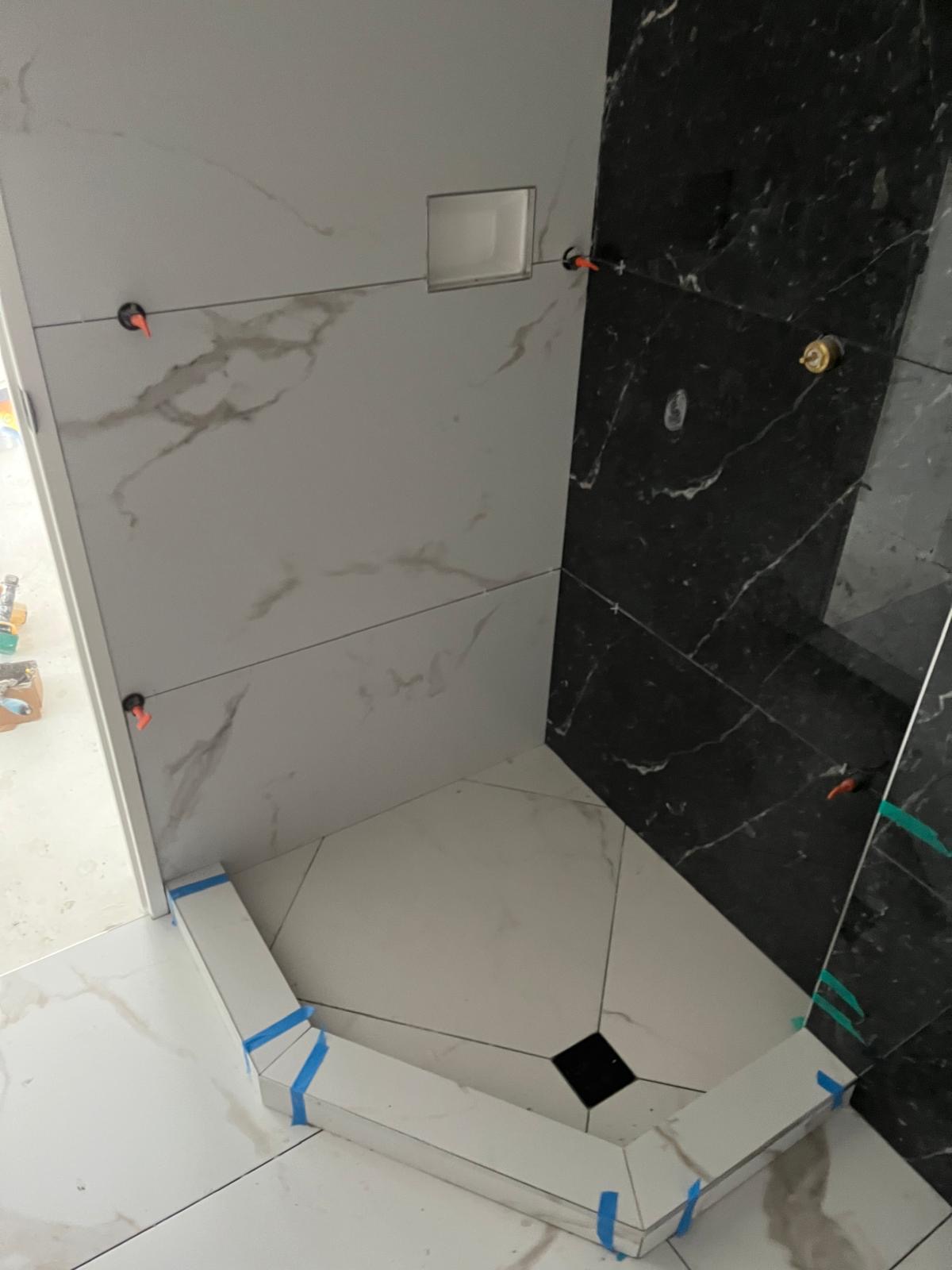 Bathroom renovation — shower tray tiling